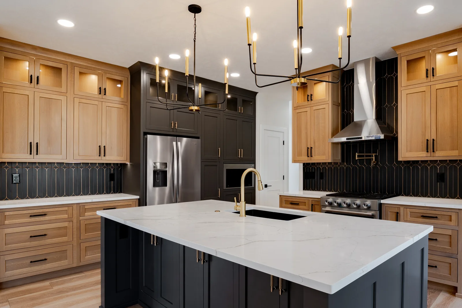 The Vista House — Kitchen island with pendant lighting