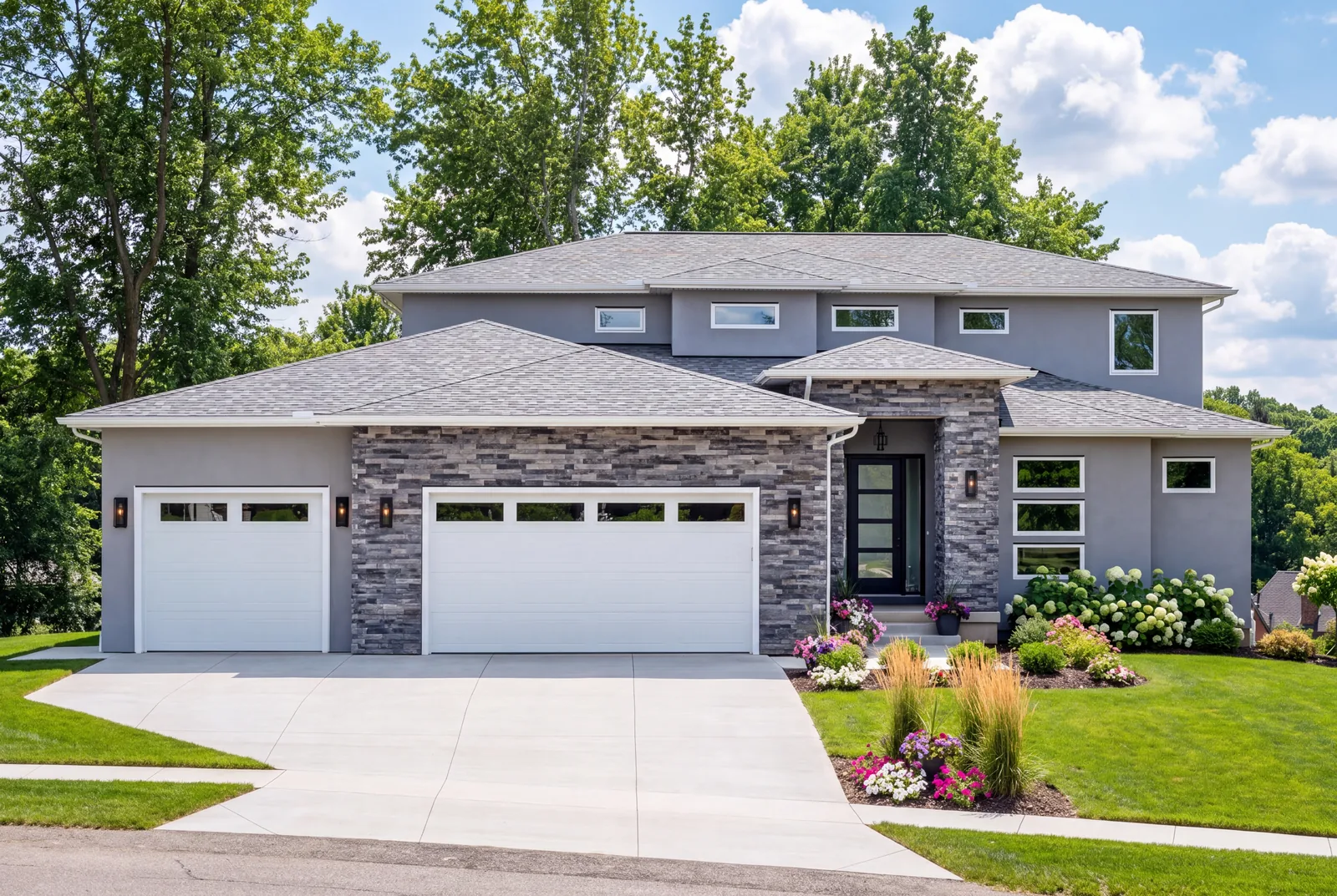The Evergreen Residence — Front entrance and attached garage