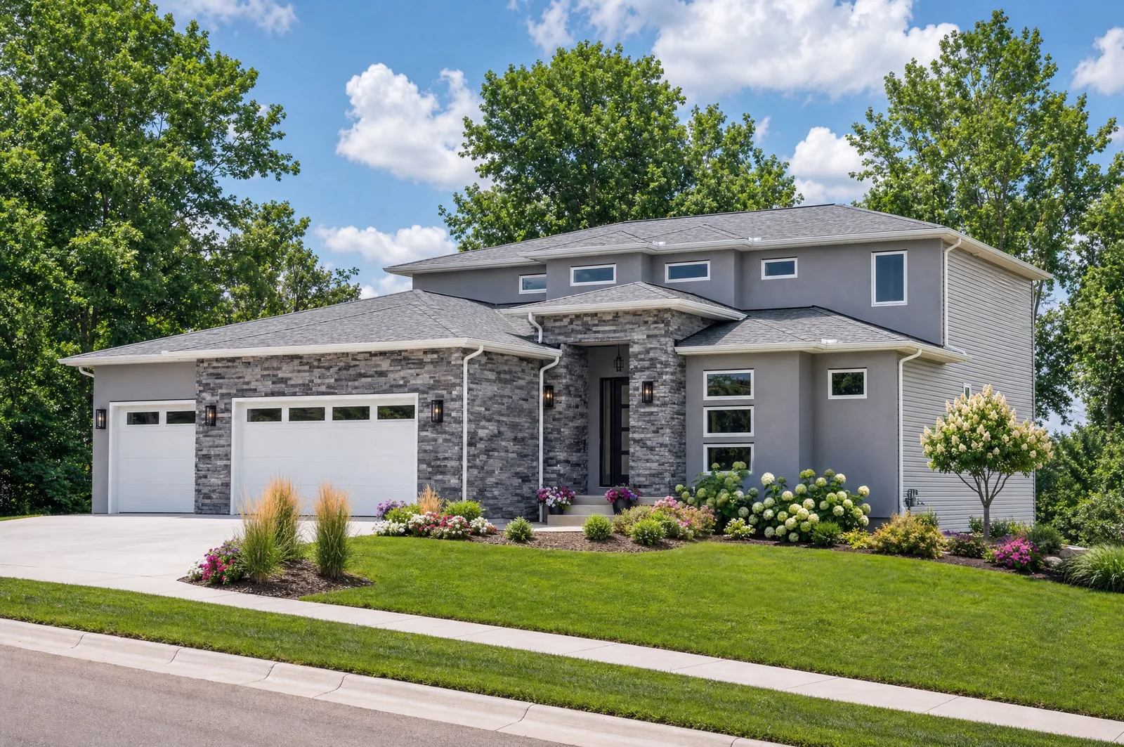 The Evergreen Residence — Front exterior framed by mature trees