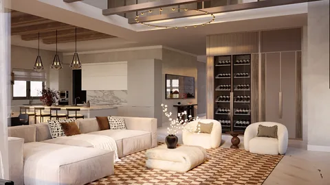 Open-plan living room with cream seating, a patterned rug, wine cabinets, and an adjoining kitchen.
